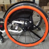 ORANGE 24" SUPER GRIP SILICONE PUSH RIM COVERS. PRICE IS FOR A SET OF 2