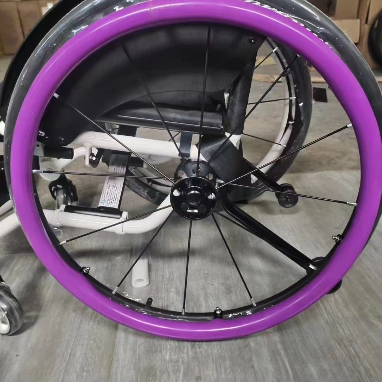 PURPLE 24" SUPER GRIP SILICONE PUSH RIM COVERS. PRICE IS FOR A SET OF 2