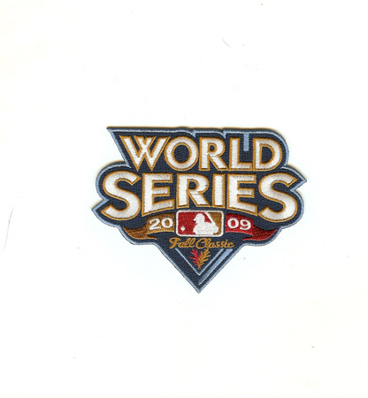 World Series 2009 Fall Classic (Yankees vs Phillies); 3 3/8" Tall X 4 1/2" Wide; 100% Embroidery; Knife Cut to Shape; Collector Patch Backing (UPC # 813300010729)