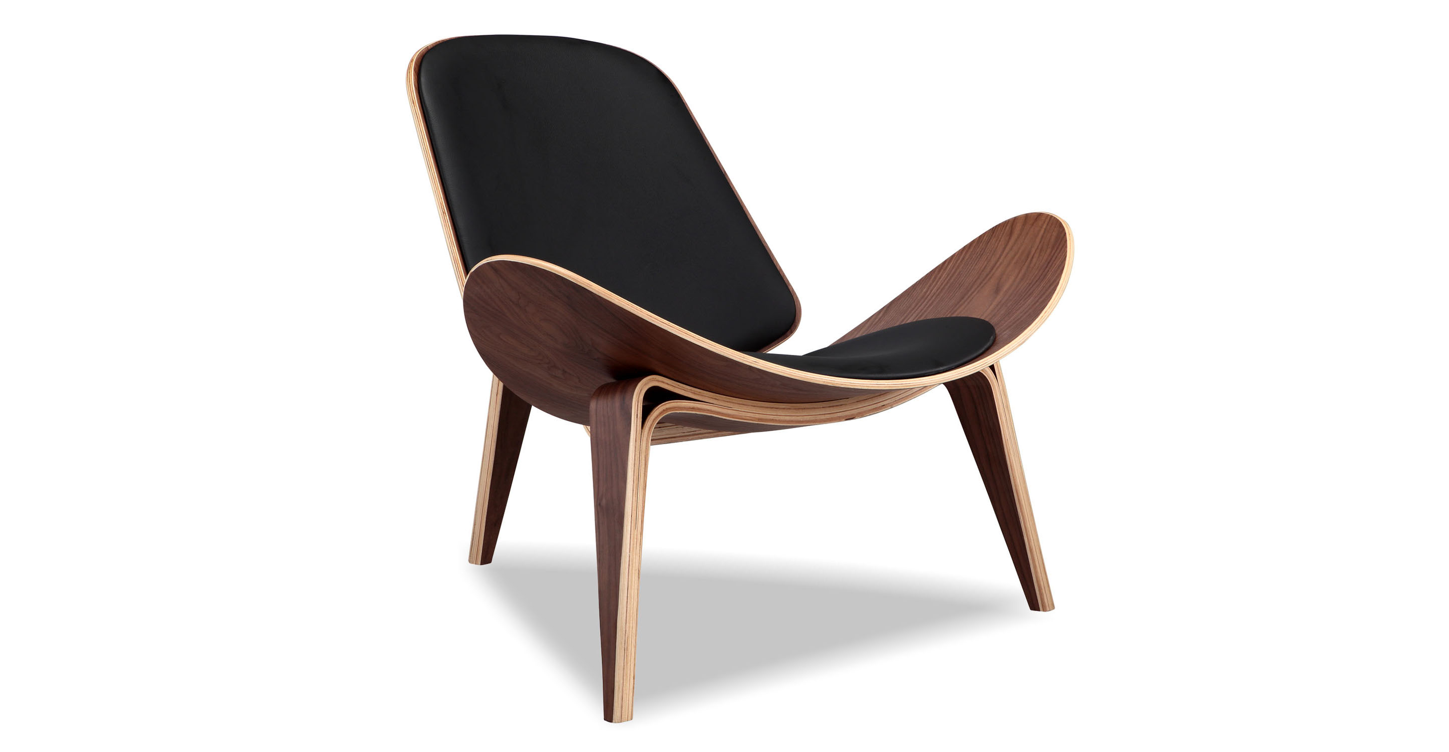 Image shows left facing view of Mid-Century Modern Tripod Lounge Chair in Black Italian leather. The chair has Walnut frame and legs. The chair has fixed cushions. The chair's seat curves upward on the sides.