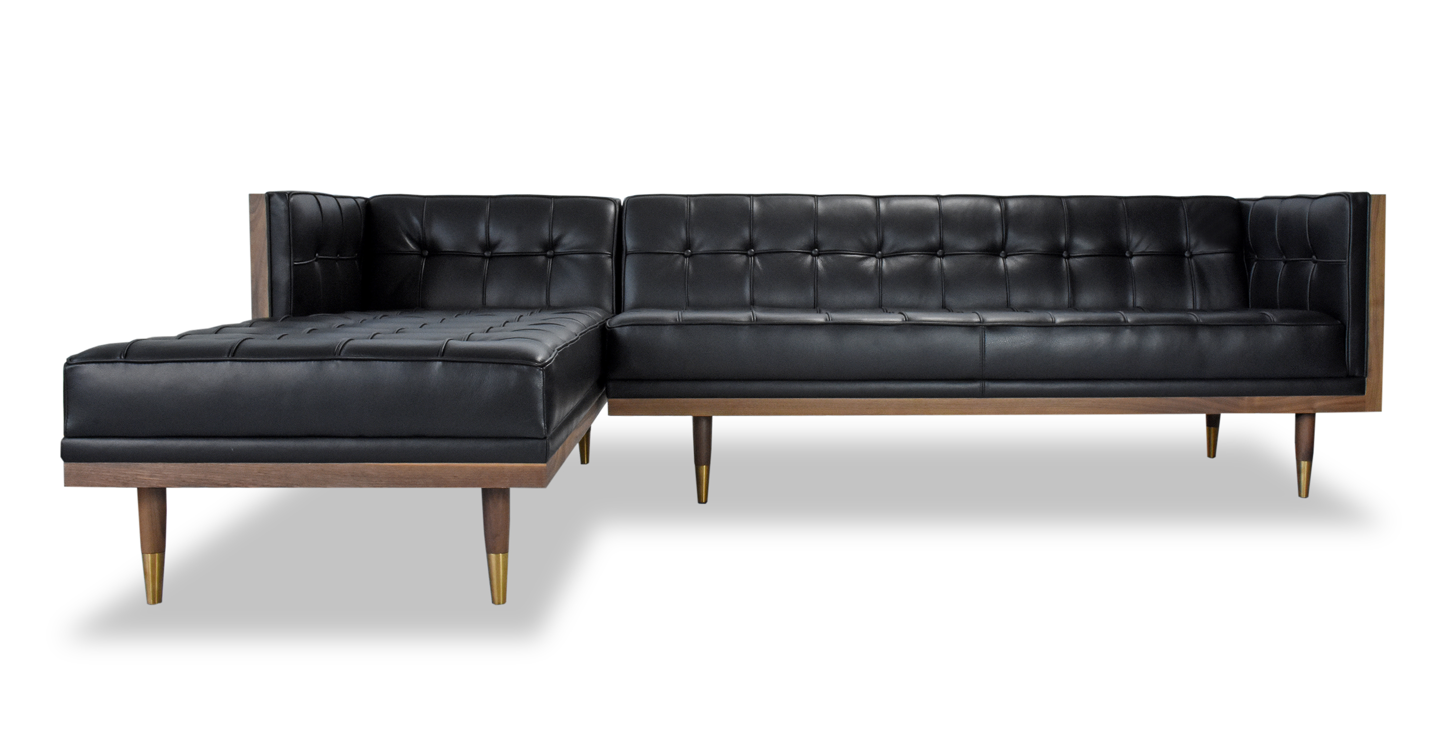 Woodrow Left Facing Sectional in Black Leather has fixed seat and back cushions. There is button tufting on the back cushion, sides of the sofa and on the seat cushions. The frame and legs are walnut colored. The legs have brass colored ferrules on the ends. The back and outsides of the sectional are wooden. The leather color is black.
