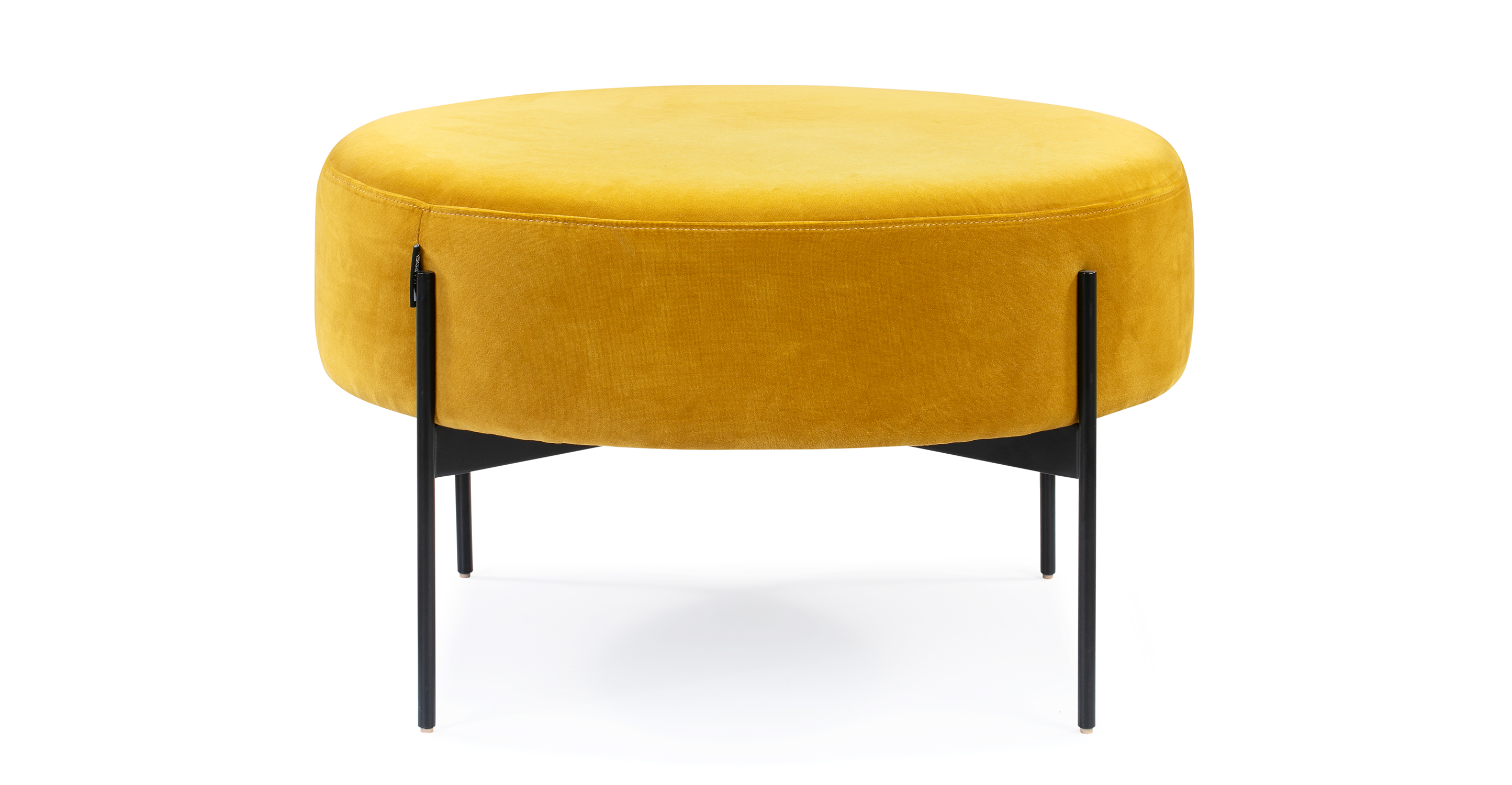 Glimmer Dot ottoman features a round cushioned top that provides a comfortable seating or footrest option. It is supported by four black metal legs with a unique x-crossed bracing underneath, ensuring stability and durability. The legs extend upward about three-quarters of the way up the cushion, securely holding it in place. With its modern, classic, and fun design, the Dot ottoman adds a touch of style and versatility to any space.