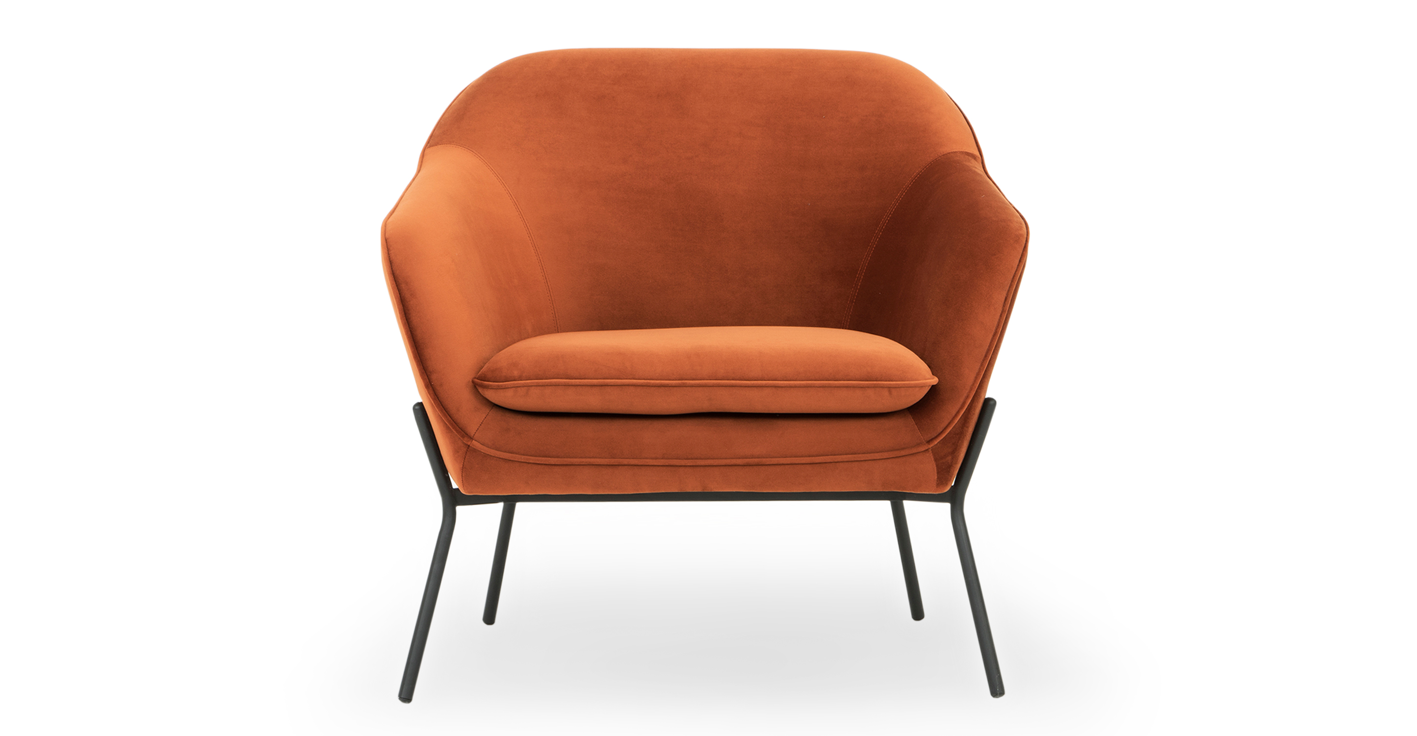 Rust Margot chair has a slightly rounded back that gently slopes into arms on both sides. Piping goes along the edge where the interior of the chair meets the sides and back. The seat cushion is removable. The four black metal frame is exposed and extends up the sides of the chair for support and visual interest. Vibe is fun, modern, and simplistically classic design.