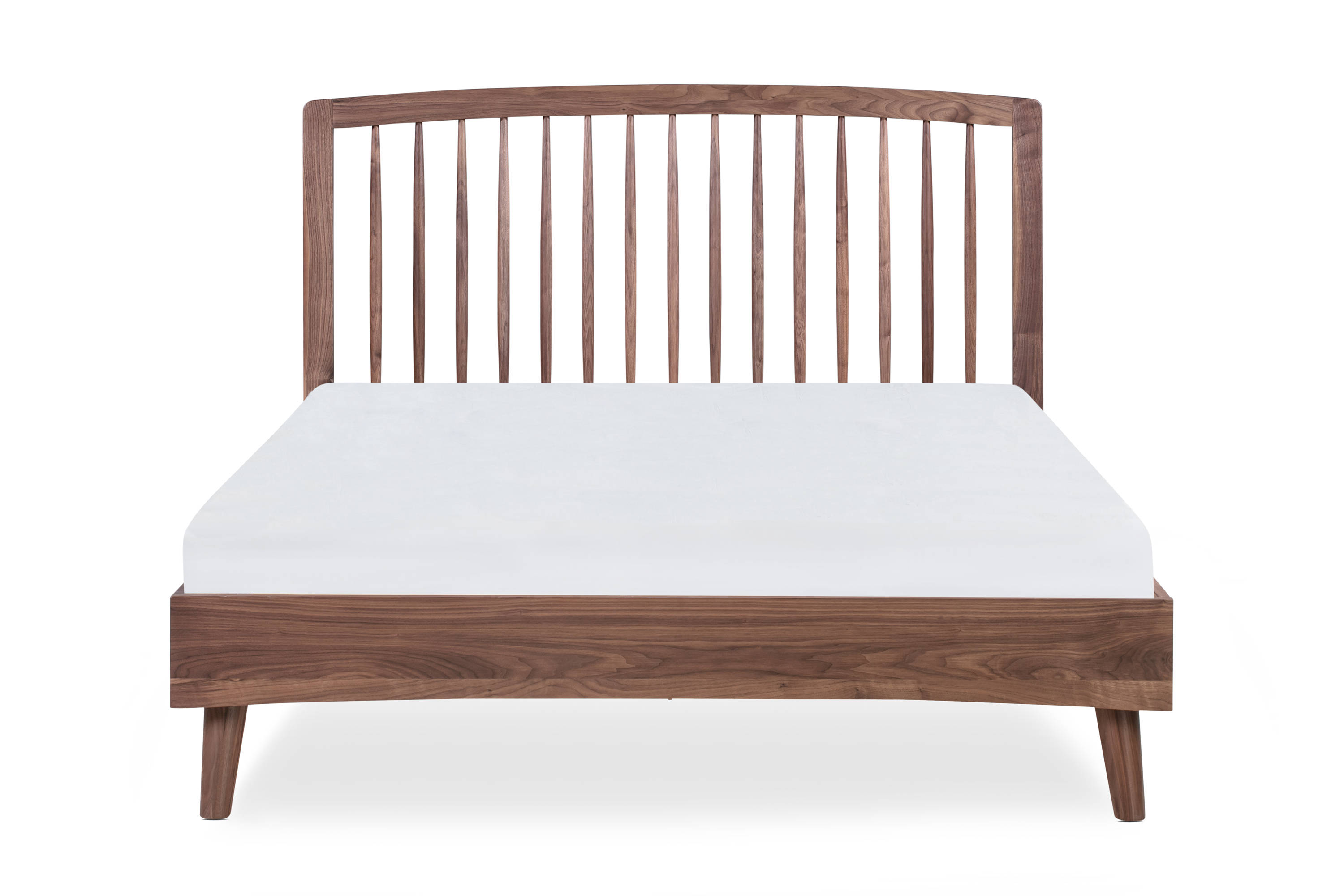 Image shows Modern Spindle Queen Bed Frame in Walnut. A thin edge frames the wood headboard, which is supported by tapered spindles. The bed frame has angled wooden legs.