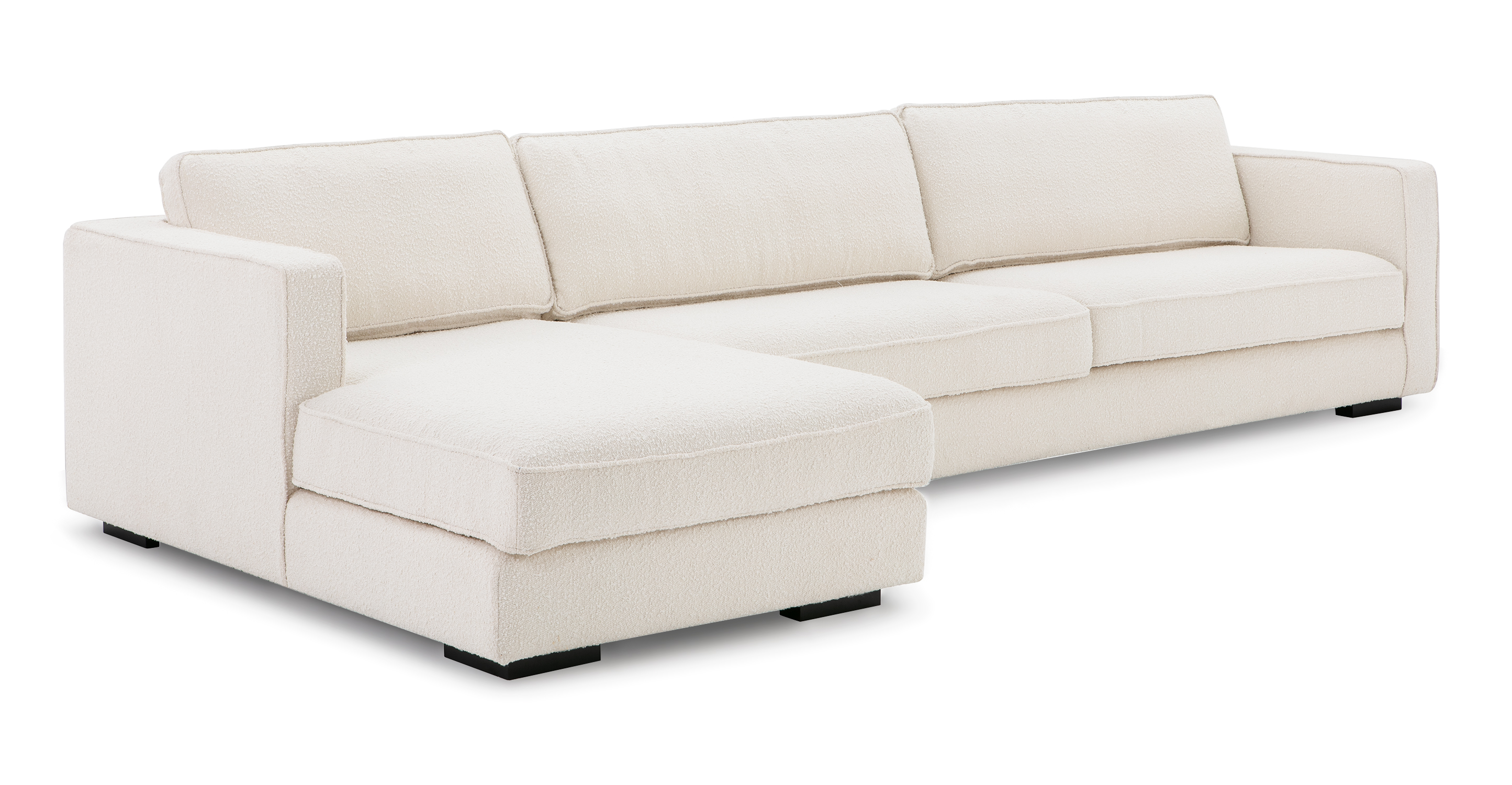 Image shows the Architect Modern Contemporary Left Facing Sectional Sofa in Blanc Indigenous Boucle. Sofa has three removable back cushions that extend past the back of the sofa. The three seat cushions are also removable. The sofa's feet are low profile black wooden blocks.  