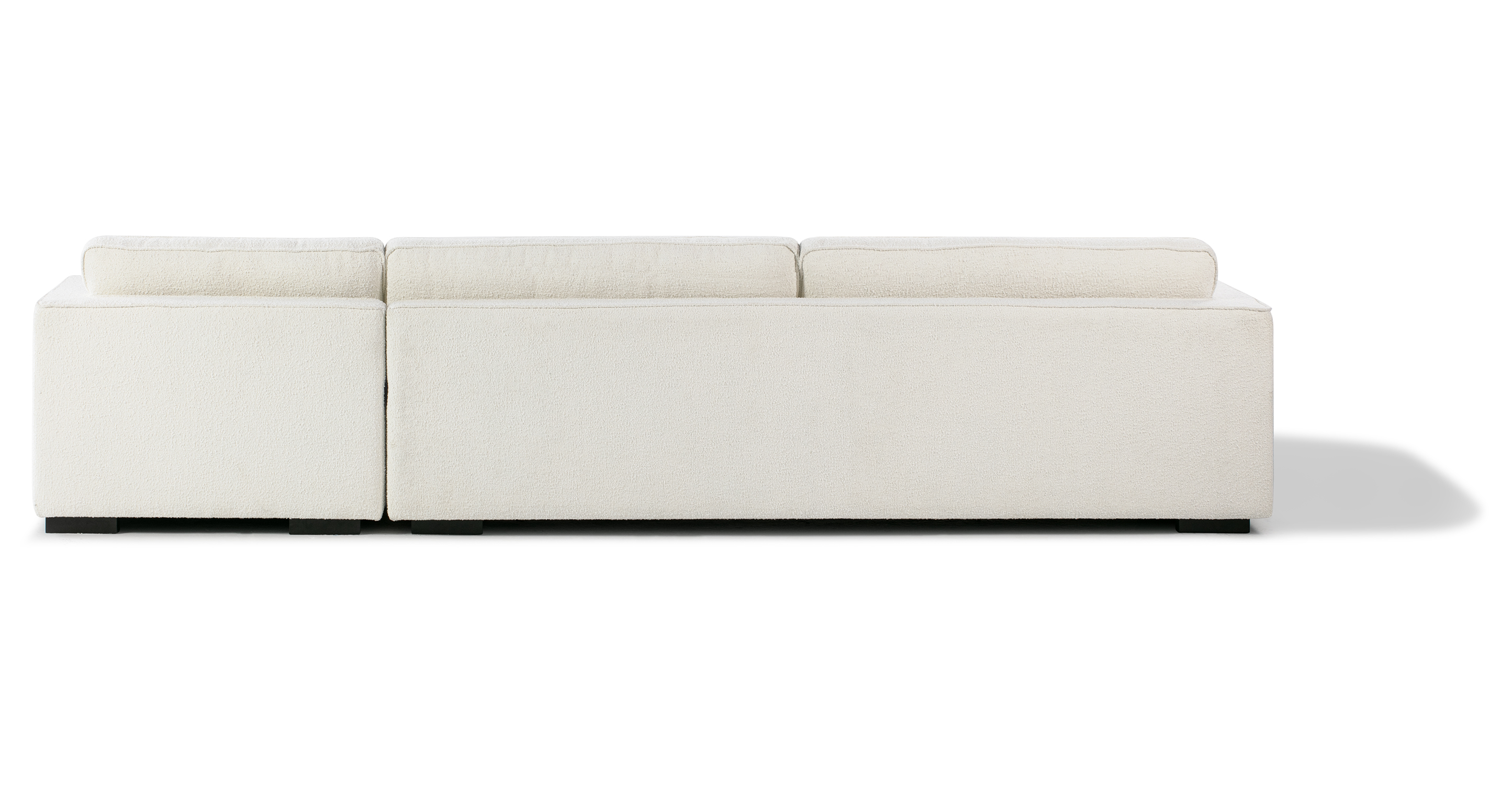Premium AI Image  Contemporary Minimal White Fabric Bolster Back Corner  Sofa Generative AI