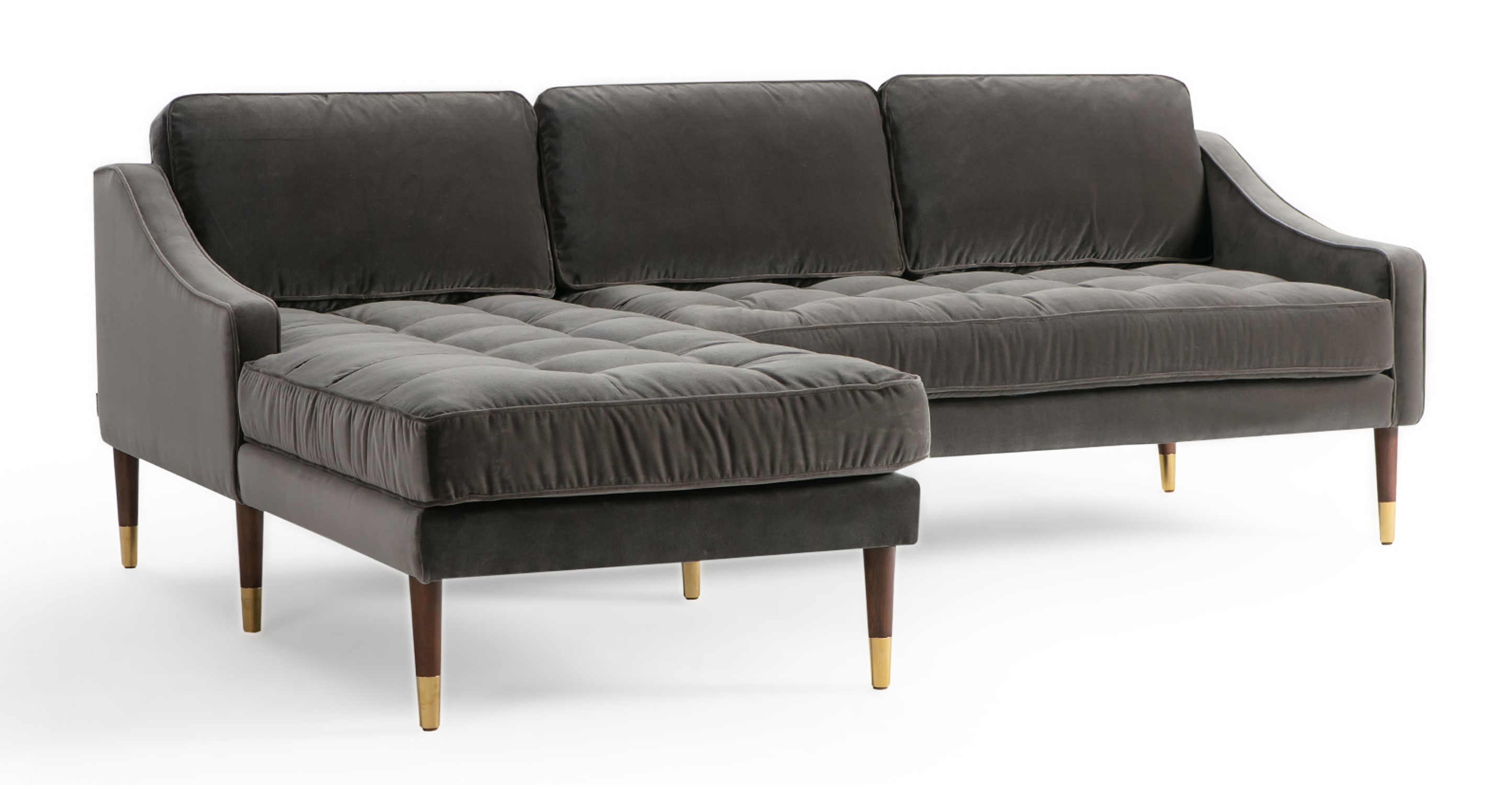 Brando is a modern sectional in gray fabric. The chaise of the sectional, when you are facing the sectional, is on the left and the sofa portion is on the right. Walnut stained legs with gold tips toward the floor. The sofa fully upholstered and has swooping arms that taper from the back, down to the front. Both back and seat cushions are removable. The back cushion is smooth, the seat cushion is tufted. (facing front)