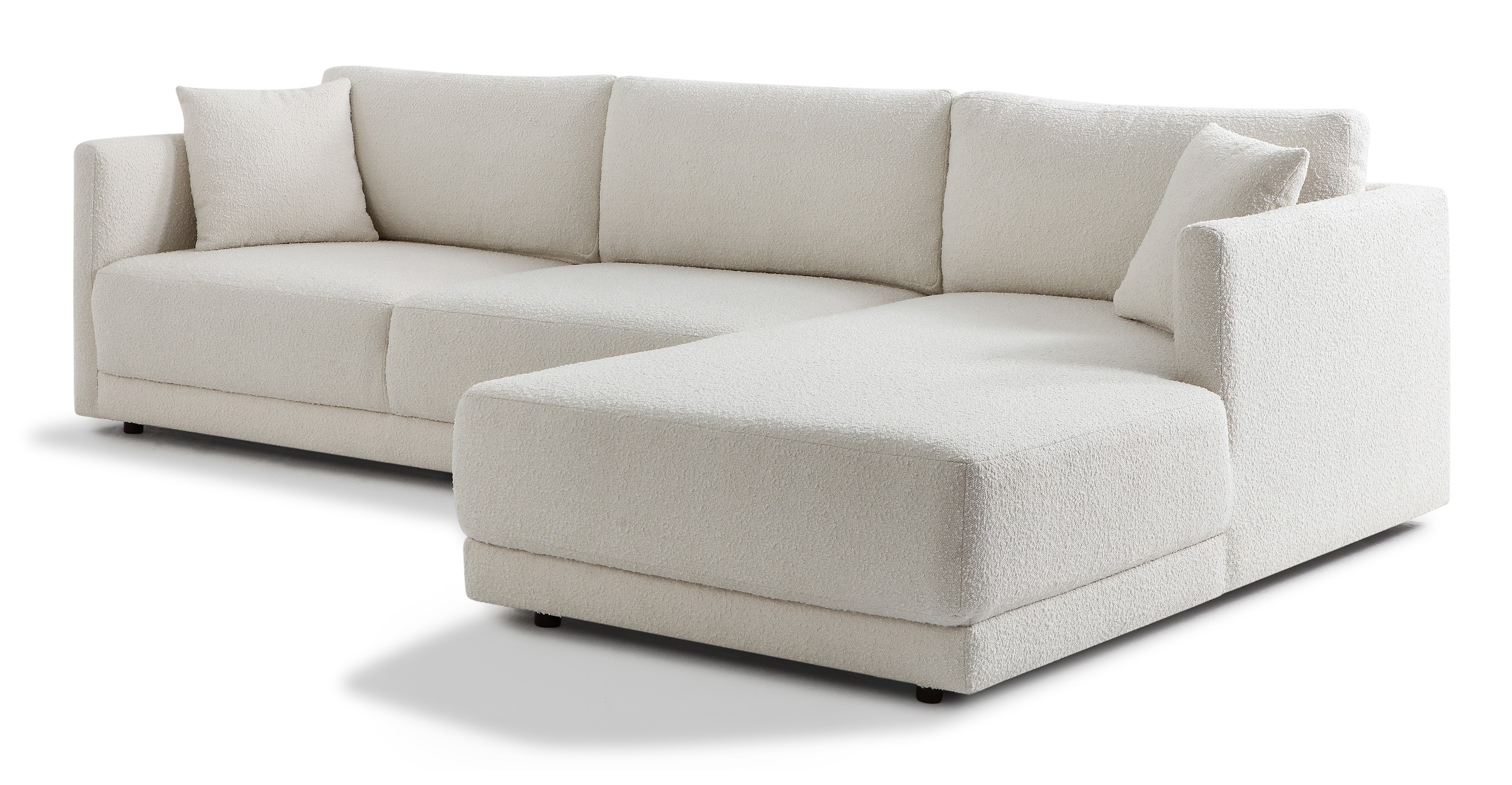 Blanc Domus right sectional is a floor sectional with a chaise on the right (when facing the sectional) and a sofa option on the left. This sofa has removable back cushions, low profile arms, and is 100% upholstered. The sofa is floor based and 100% upholstered. This item can be used alone or added as part of the Domus series. The style is modern and minimalist. 