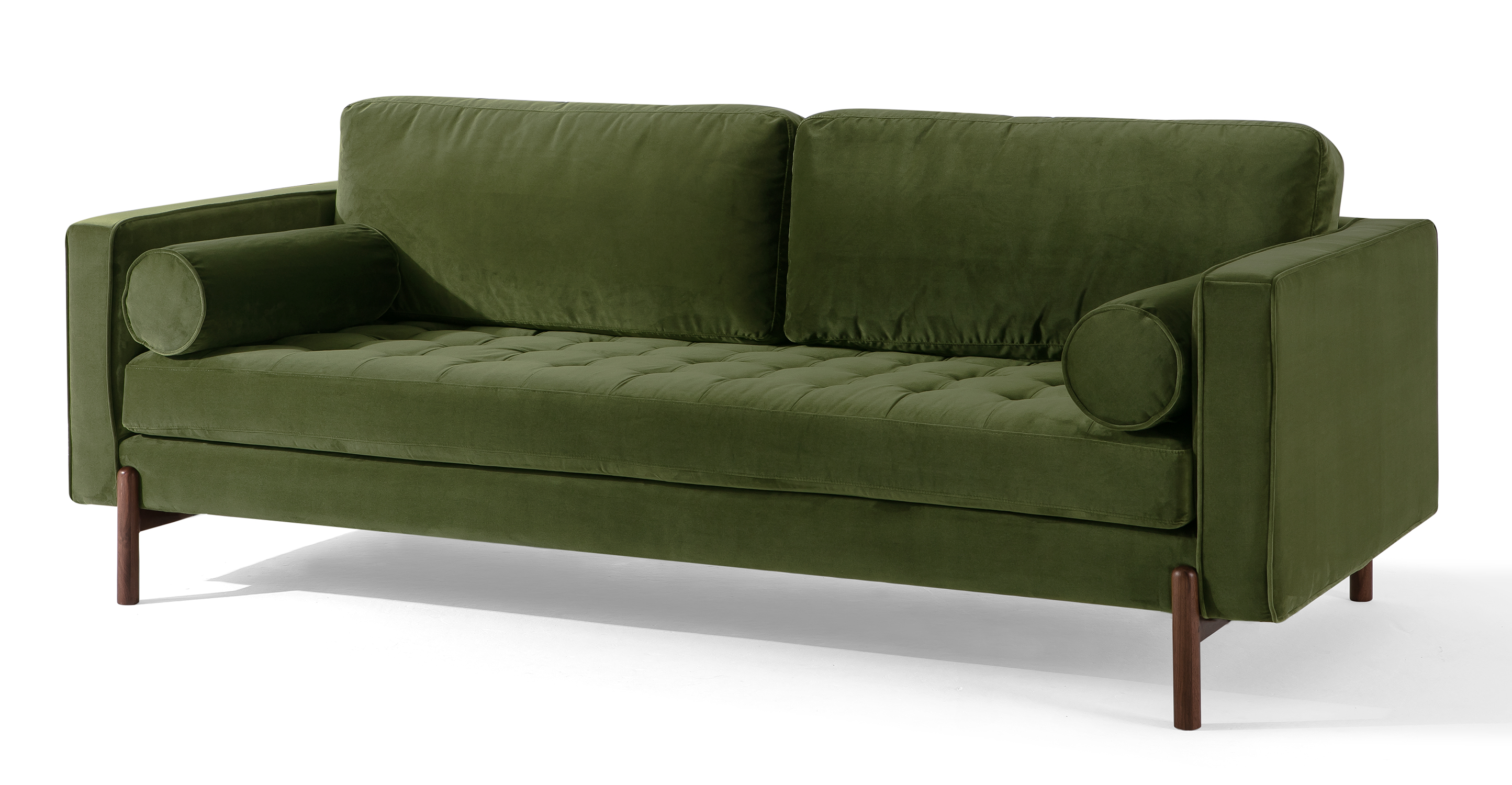 Dwell Fern modern sofa is 100% upholstered and features squared piping arms that meet two squared back cushions, creating a sleek and contemporary design. It comes with a single removable tufted seat cushion for added comfort, along with two bolsters on the sides to provide extra support. The two back cushions are also removable and extends beyond the chair frame, adding an interesting visual element. Four wooden leg supports add a touch of natural warmth and stability to the overall look.