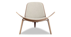 Image shows front view of Mid-Century Modern Tripod Lounge Chair in Urban Hemp Vintage Tailored Twill fabric. The chair has Walnut frame and legs. The chair has fixed cushions. The chair's seat curves upward on the sides.