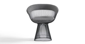 The Platner dining chairs have a wide base that tapers up and meets a bucket seat also made of black stainless steel rods. The arms and black are cushioned with upholstery and the seat has a removable cushion. 