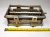 Hammarlund TCD-50-A dual section air variable capacitor, approximately 22-56 pF per section, rated about 7000 V. Heavy-duty transmitting style unit roughly 7-1/2 inches long with 1/4 inch shaft and wide .175 inch air gap. Ideal for high-power RF amplifiers, antenna tuners, and ham radio projects. Features ceramic insulation and robust construction from the classic Hammarlund TCD series. Quality vintage American-made variable capacitor for reliable high-voltage performance. Available from Nationwide Radio & Eq. Sales.