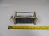 Vintage NOS Bud 865 single-section air variable capacitor, 14–104 pF. Features 1/32-inch plate spacing, 1/4-inch shaft, ceramic end plates, and aluminum construction. Measures approximately 4⅝" long × 1¾" wide × 1¾" high. Approximately 1500 V peak rating based on air gap. Excellent for classic radio restoration, QRP transmitters, antenna tuners, or experimental RF work. Smooth dual-bearing rotation and solder-lug terminals. Quality used Bud single-section variable capacitor perfect for boat-anchor builders and collectors of vintage radio components.