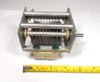 General Electric military surplus P7761569-6 single-section air variable capacitor. Measured range approximately 20–84 pF with ~1/16″ plate spacing and high voltage rating around 4000 V peak. Rugged USA military-spec unit with 1/4″ shaft, ideal for HF amplifiers, antenna tuners, or radio restoration projects. Measures about 4.6″ long × 2.75″ wide. Excellent condition for age. Perfect for ham radio builders seeking authentic high-voltage surplus components.