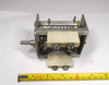 General Electric military surplus P7761569-6 single-section air variable capacitor. Measured range approximately 20–84 pF with ~1/16″ plate spacing and high voltage rating around 4000 V peak. Rugged USA military-spec unit with 1/4″ shaft, ideal for HF amplifiers, antenna tuners, or radio restoration projects. Measures about 4.6″ long × 2.75″ wide. Excellent condition for age. Perfect for ham radio builders seeking authentic high-voltage surplus components.
