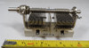 Hammarlund MCD-140M dual-section air variable capacitor. Approximately 10–148 pF per section at 800 V peak with 0.0245″ plate spacing. Classic USA-made Hammarlund midget split-stator unit with 1/4″ shaft and ceramic base, ideal for HF receivers, low-power transmitters, antenna tuners, or vintage radio projects. Measures about 4.5″ overall. Excellent condition. Perfect for ham radio builders seeking authentic Hammarlund dual variables.