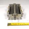 Military surplus G.E. T7660443-6 single-section air variable capacitor, 23–160 pF, approximately 1500 V peak rating. Classic USA-made multi-plate design with ceramic insulators, 1/4-inch shaft, and ~1/32-inch plate spacing. Ideal for amateur radio transmitters, receivers, antenna tuners, or restoration projects. Measures about 4-3/4 × 3-1/2 × 2-1/4 inches. Solid condition for surplus gear—perfect for ham radio builders needing reliable RF tuning components.