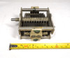 Military surplus G.E. T7660443-7 single-section air variable capacitor, 20–86 pF, approximately 1500 V peak rating. Classic USA-made multi-plate design with ceramic insulators, 1/4-inch shaft, and ~1/32-inch plate spacing. Ideal for amateur radio transmitters, receivers, antenna tuners, or restoration projects. Measures about 3-3/4 × 3-1/4 × 2-1/4 inches. Solid condition for surplus gear—perfect for ham radio builders needing reliable RF tuning components.