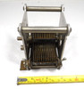 Unmarked single-section brass-plate air variable capacitor, 23–562 pF, approximately 1000 V peak rating. Compact multi-plate design with ~1/64-inch plate spacing and 1/4-inch shaft. Measures about 3-1/2 × 3-1/2 × 3-7/8 inches. Ideal for amateur radio receivers, restoration projects, or RF tuning applications needing a high-capacitance low-voltage component.