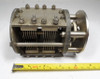 KS-8534 dual-section air variable capacitor (Western Electric / Bell System style), unit #708. Each section 9–82 pF with sequential meshing design — one section fully meshes before the other begins. Approximately 1/32-inch plate spacing, ¼-inch shaft with removable ceramic coupler. Compact heavy-duty 4¾ × 3 × 3¼-inch frame ideal for RF projects, differential tuning, vintage communications equipment, and high-voltage experimental work. Typical 1500–2500 V rating. Solid bolted construction with multiple terminals. Clean used condition ready for service.