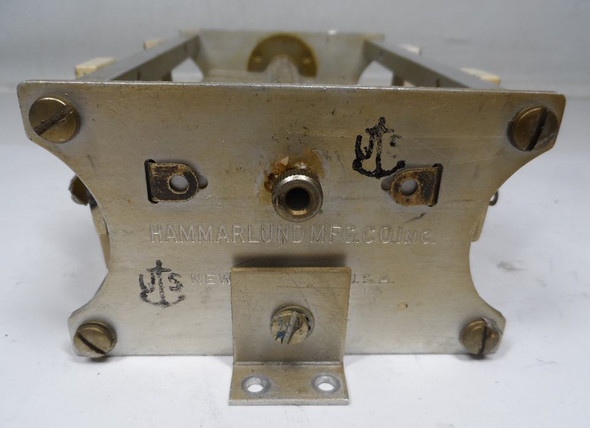 Hammarlund 7606108-7 single section air variable capacitor, 37-110 pF range, rated 6750 V AC peak. Heavy-duty approximately 8 inch long transmitting style unit with 1/4 inch shaft. Ideal for high-power RF amplifiers, antenna tuners, and amateur radio projects. Features ceramic insulation and robust brass frame construction matching NSN 5910-00-187-5719 characteristics. Quality vintage Hammarlund manufacturing for reliable high-voltage performance. Available from Nationwide Radio & Eq. Sales. ke9pq.com