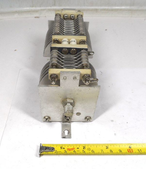 Vintage dual-section air variable capacitor, 15–166 pF and 11–88 pF. Features 1/64-inch plate spacing, 1/4-inch shaft, aluminum frame, and ceramic insulators. Measures approximately 7¾" long × 2½" wide × 3⅜" high. Approximately 1000 V peak rating based on air gap. Excellent for classic radio restoration, multi-band HF receivers, antenna tuners, or experimental RF projects. Smooth dual-bearing rotation and multiple stator terminals. Quality used dual-gang variable capacitor perfect for boat-anchor builders and collectors of vintage radio components.