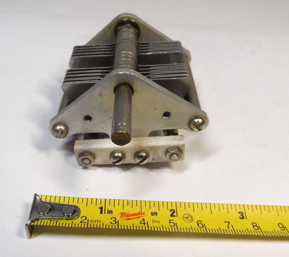 National dual-section air variable capacitor, 10–105 pF per section, approximately 1000 V peak rating. Compact multi-plate design with ~1/64-inch plate spacing and 1/4-inch shaft. Measures about 3-1/2 × 2-1/2 × 2-5/8 inches. Ideal for amateur radio receivers, restoration projects, or RF tuning applications needing matched ganged sections for simultaneous tuning.