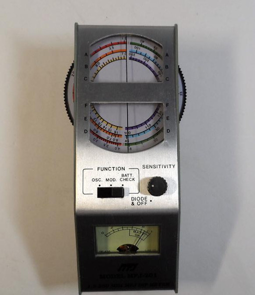 MFJ-201 Solid State Grid Dip Meter in like new condition. Covers 1.5-250 MHz across 6 bands with thumbwheel tuning and color-coded scales. Compact handheld design, battery powered (9V), includes meter, sensitivity control, and headphone jack. Perfect for checking resonant frequencies of antennas, coils, traps, and tuned circuits; use as absorption wavemeter, test oscillator, or for coax length measurements. Excellent cosmetic condition with minimal signs of use. Note: No coils included