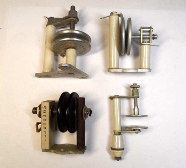 Set of 4 used vintage variable neutralizing capacitors for tube HF amplifiers and transmitters. Includes large disc-style USA-made units and smaller adjustable types. Excellent condition — perfect for restoring EF Johnson Viking, Hallicrafters, Heathkit, or homebrew linear amplifiers