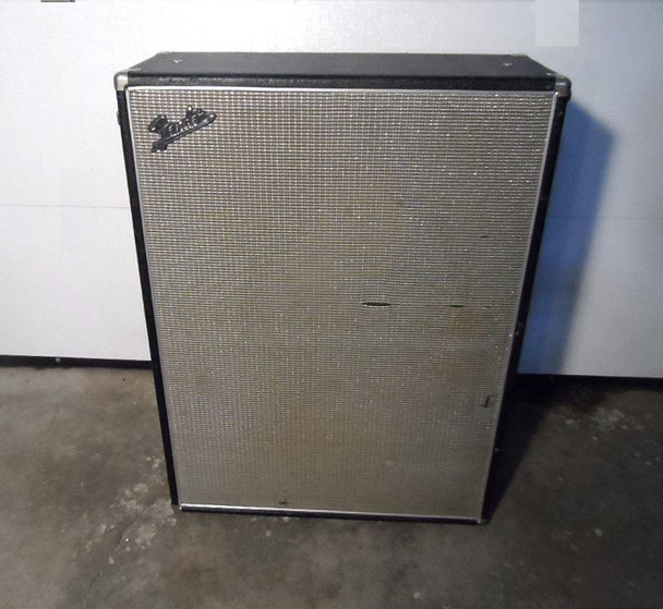 Vintage empty Fender 2x12 speaker cabinet (P28104). Measures 39¼"H x 29¼"W x 11½"D. Black tolex, silver grille with Fender logo, Collins & Cole Acoustics (Fort Worth, TX). Solid 1970s construction — perfect for Jensen, Celestion, or custom speaker loading. Great for Fender Bassman or guitar rig restoration.