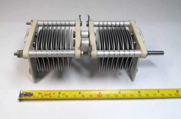 Genuine E.F. Johnson 154-505-4 dual-section air variable capacitor. Each section approximately 12-105 pF (catalog 10-99 pF), 0.075″ plate spacing, 2200 V peak rating. Compact Type E design with steatite insulation, aluminum plates, and ¼″ shaft. Ideal for ham radio, antenna tuners, amplifiers, transmitters, and RF projects. Dimensions approx. 7½″ L × 2⅝″ W × 2⅝″ H. Classic Waseca, MN quality. Clean used condition. Perfect for restoration or new builds needing reliable dual air-variable capacitance.