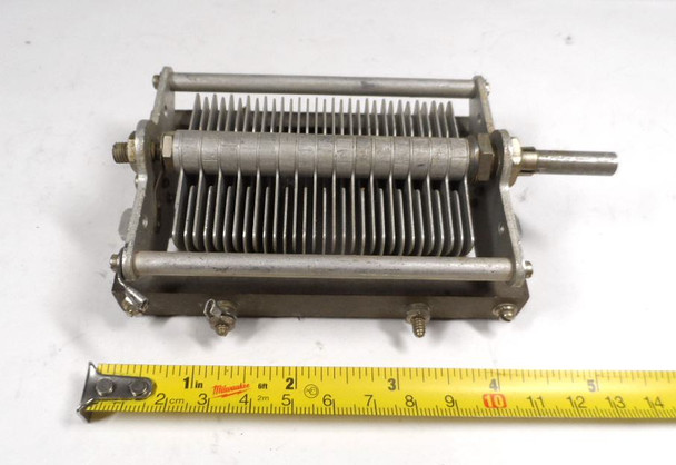 Cardwell 429-8 single-section air variable capacitor. Measured range approximately 20–155 pF with ~1/32″ plate spacing and estimated 1000 V peak rating. Rugged USA-made Cardwell unit with 1/4″ shaft, ideal for HF amplifiers, antenna tuners, or radio restoration. Measures about 5.4″ long × 3″ wide. Excellent condition for age. Perfect for ham radio builders seeking authentic Cardwell surplus components.