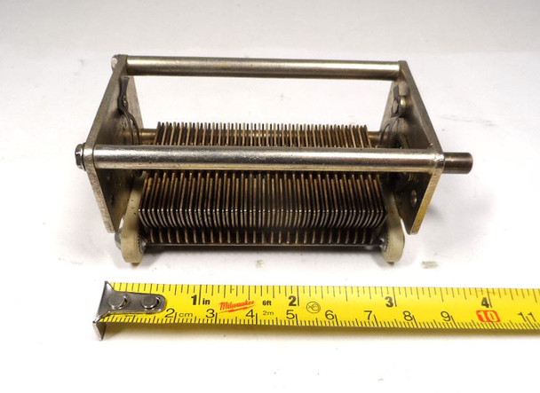 Vintage Hammarlund C-6558 single-section air variable capacitor, 22–454 pF, approximately 1000 V peak rating. Compact USA-made multi-plate design with ~1/64-inch plate spacing and 1/4-inch shaft. Measures about 4 × 1-3/4 × 1-3/4 inches. Ideal for amateur radio receivers, restoration projects, or RF tuning applications needing a reliable high-capacitance component in a small frame.