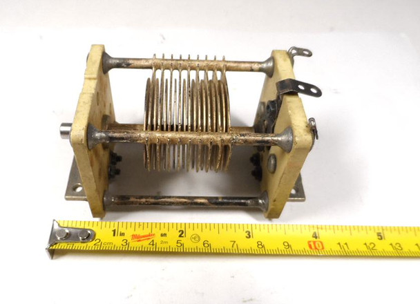 Vintage Westinghouse 962 single-section air variable capacitor, 12–108 pF, approximately 1500 V peak rating. Compact USA-made multi-plate design with ~1/32-inch plate spacing and 1/4-inch shaft. Measures about 4 × 2 × 2 inches. Marked with Westinghouse W logo and 100 MMFD. Ideal for amateur radio receivers, restoration projects, or RF tuning applications needing a reliable low-loss component.