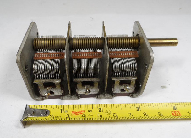 Genuine Radio Condenser Company (RC) triple-section air variable capacitor marked 273 6228 226. Each section measures 12–375 pF with approximately 1/64-inch plate spacing and a 1/4-inch × 1-inch shaft. Compact 4-3/8 × 1-7/8 × 2-inch size ideal for AM broadcast receivers, restorations, crystal sets, antenna tuners, and homebrew RF projects. Typical 600–700 V rating. Solid dual-bearing construction with solder-lug terminals. Clean used condition ready for immediate use in vintage or experimental radio work.