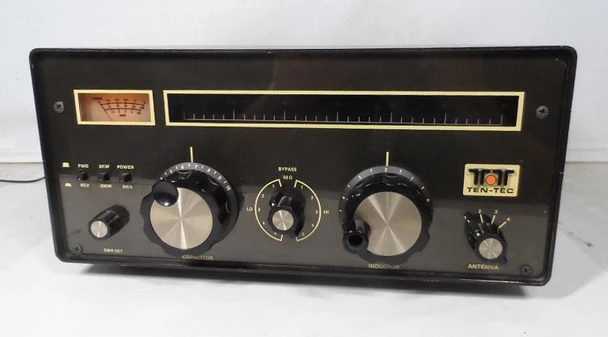 Ten-Tec 4229 / 229 HF antenna tuner kit, 1.8-30 MHz, 2kW PEP, L-network with SWR meter and balun. Matches Ten-Tec Omni, Corsair and other HF radios. Excellent condition, dial cord replacement needed. Current market value, specs, manual info and parts. Great for ham radio operators.