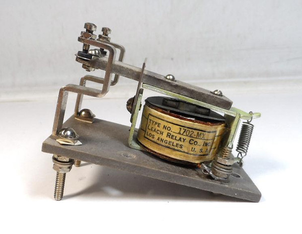 NEW in Original Box — Vintage Leach Relay Co. 1702MX with 115 VAC coil (normally closed, DPDT). Authentic military-grade relay, fresh NOS stock. Used in BC-610 transmitters and SCR-399/499 radio sets for antenna switching, T/R functions, and mode control. Perfect for restoring classic WWII/Korean War-era amateur (ham) radio Boat Anchor gear. Pristine condition with original factory box and clear markings. Tested for coil and contact operation. Ideal collector/restoration part. Ships fast and securely packaged!