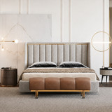Segmented Upholstery and Gold-Tone Metal: A Bench Built on Contrast