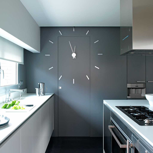 Tacon i Clock