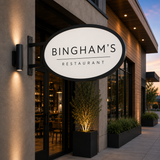 Modern Oval Fixed Sign Brackets at Bingham's Restaurant at dusk