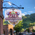 Torino Elite Hanging Blade Sign Bracket with signage in beautiful Aspen Torino Elite Hanging Blade Sign Bracket with signage in beautiful Aspen