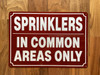 NYC SPRINKLERS IN COMMON AREAS ONLY SIGN