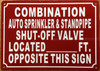 COMBINATION AUTO SPRINKLER AND STANDPIPE SHUT-OFF VALVE LOCATED FT OPPOSITE THIS SAFETY SIGN