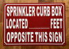 SPRINKLER CURB BOX LOCATED FEET OPPOSITE THIS SAFETY SIGN SAFETY SIGN