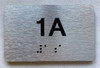 APT# 1A SILVER sign size 2.5X4 Brush silver , braille ,The park ave line