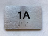APT# 1A SILVER sign size 2.5X4 Brush silver , braille ,The park ave line