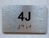 APT# 4J SILVER Ada Sign