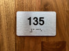 Apartment number 135 Compliance Sign