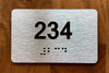 Apartment number 234 Braille Sign