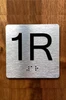 1R Elevator Jamb Plate Braille Sign